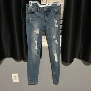 Bebe ripped skinny jeans 26